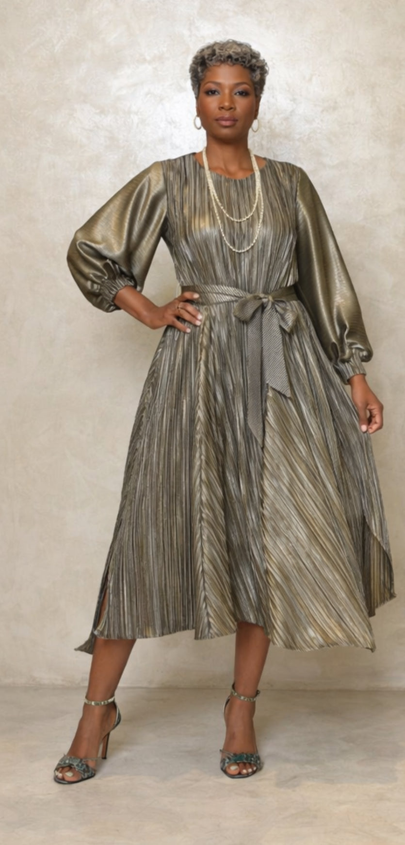 Metallic Pleats Metallic pleated dress with belt