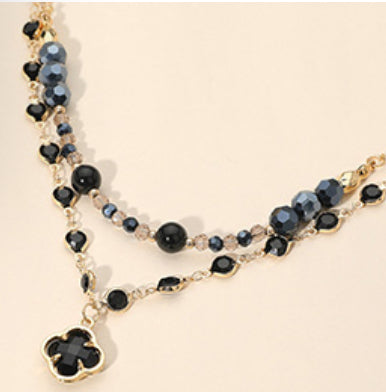 Quatrefoil Pendant Accent Dual Layer Beaded Necklace